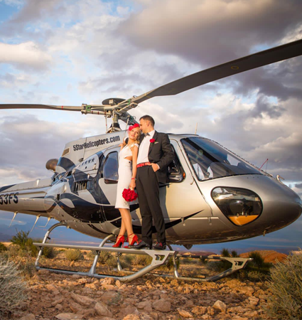 This romantic Grand Canyon & Valley of Fire helicopter wedding ceremony package includes a Private Wedding Coordinator, helicopter flight above and below the rim of the Grand Canyon, exclusive helicopter landing at the Valley of Fire State Park